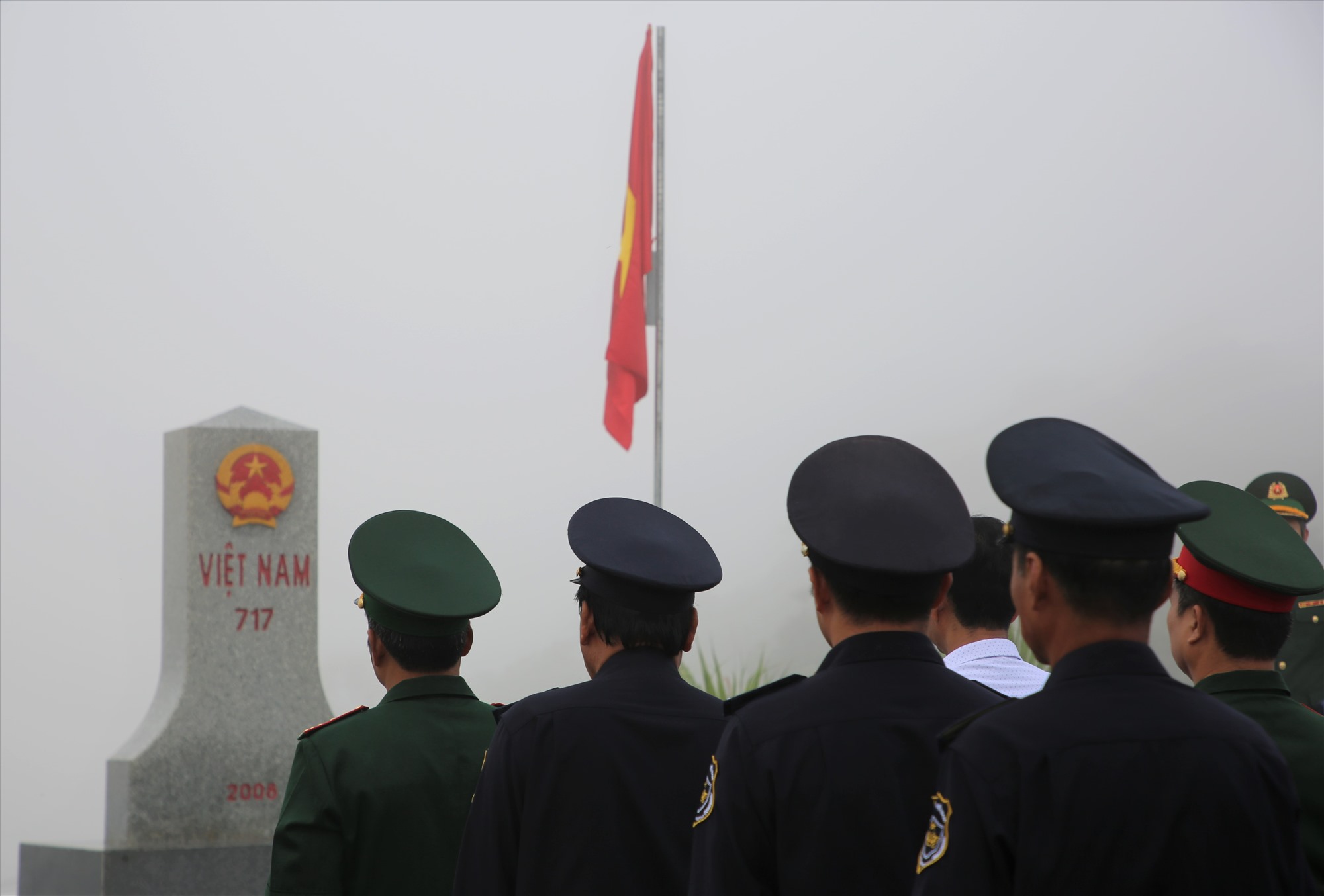Performing theflag-raising ceremony at the border marker on Vietnam's National Day